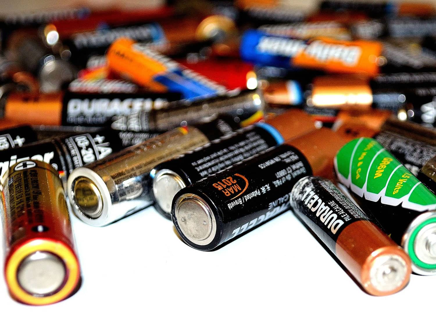 A pile of batteries in different sizes