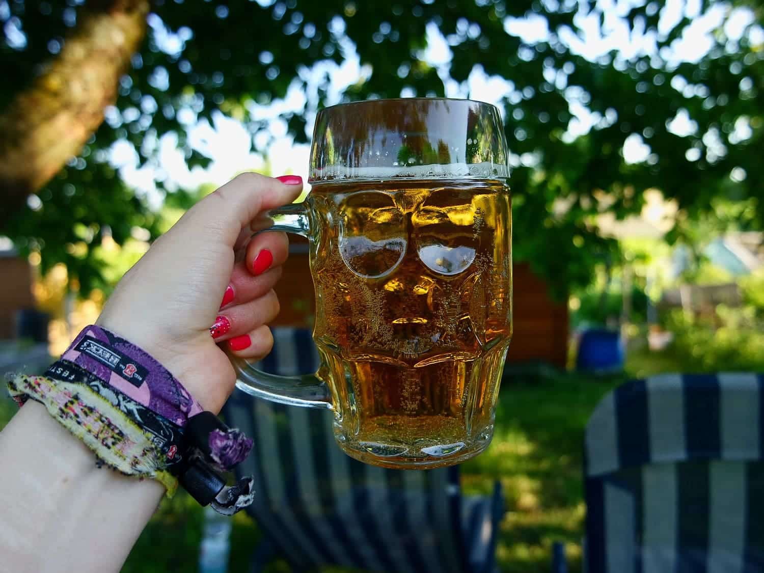 woman holding a mug of beer