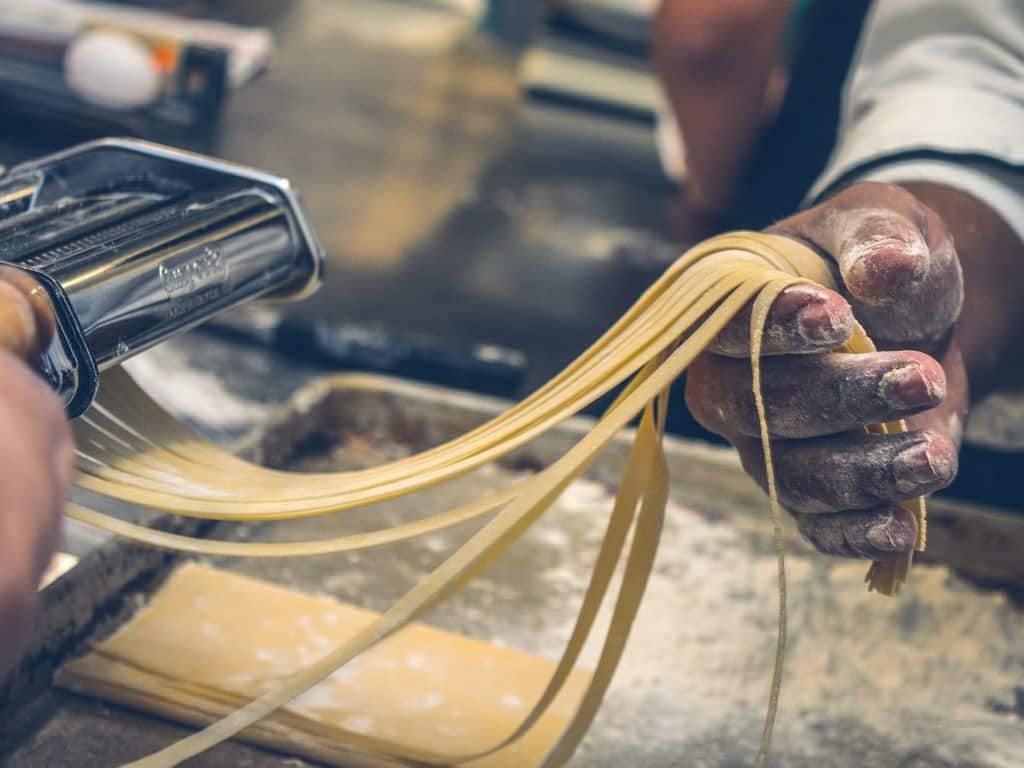 A chef making fresh pasta