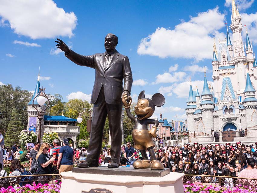 Walt Disney Statue with Mickey Mouse in front of Disney World