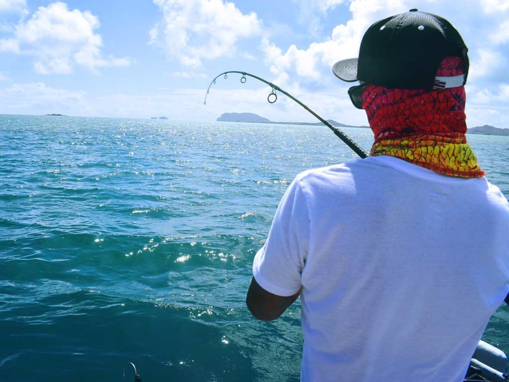 Man fishing on the water.