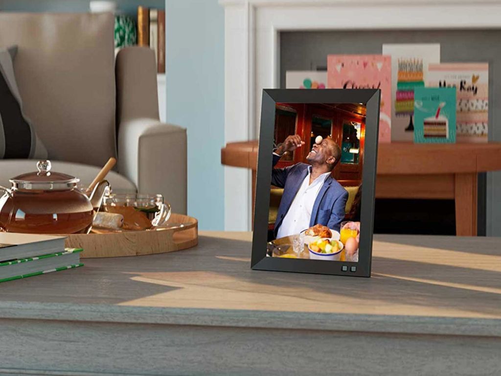 Digital photo frame on a coffee table