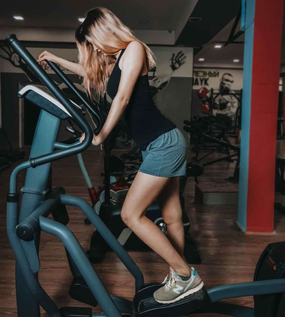 Woman on a stairclimber