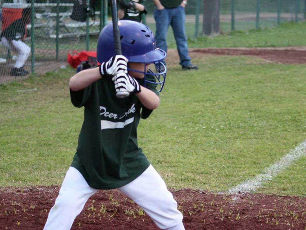 Child playing baseball