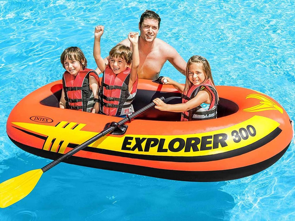 Family in a small inflatable boat.