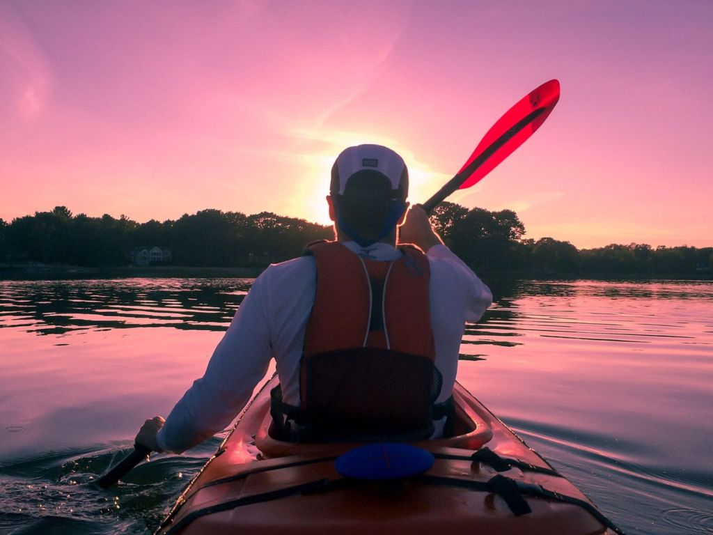 Man padding in a kayak