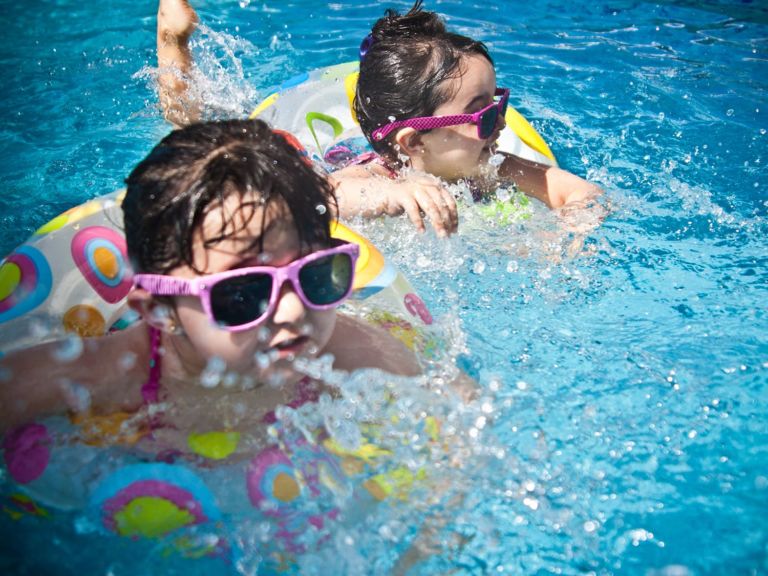 Girls swimming in a pool