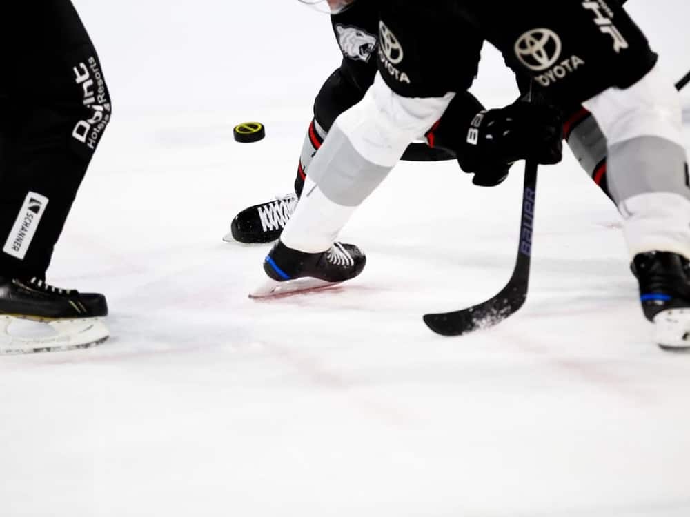 Hockey players on the ice.