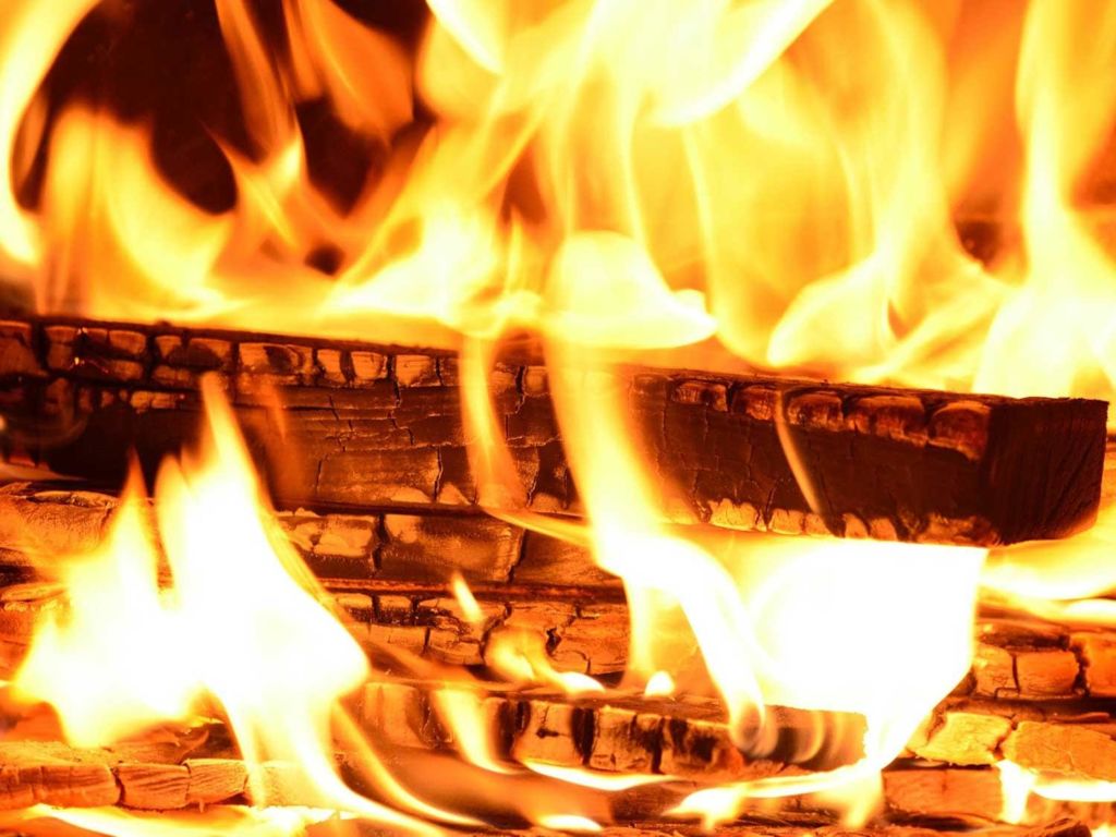 Logs in a fireplace.