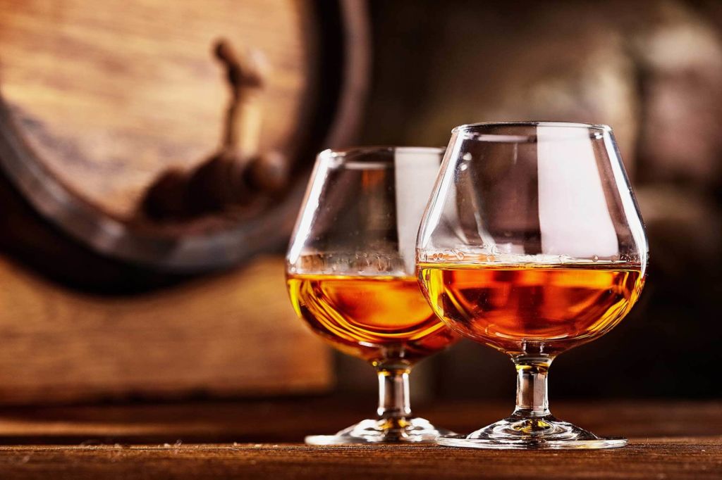 Two glasses of Conjure Cognac