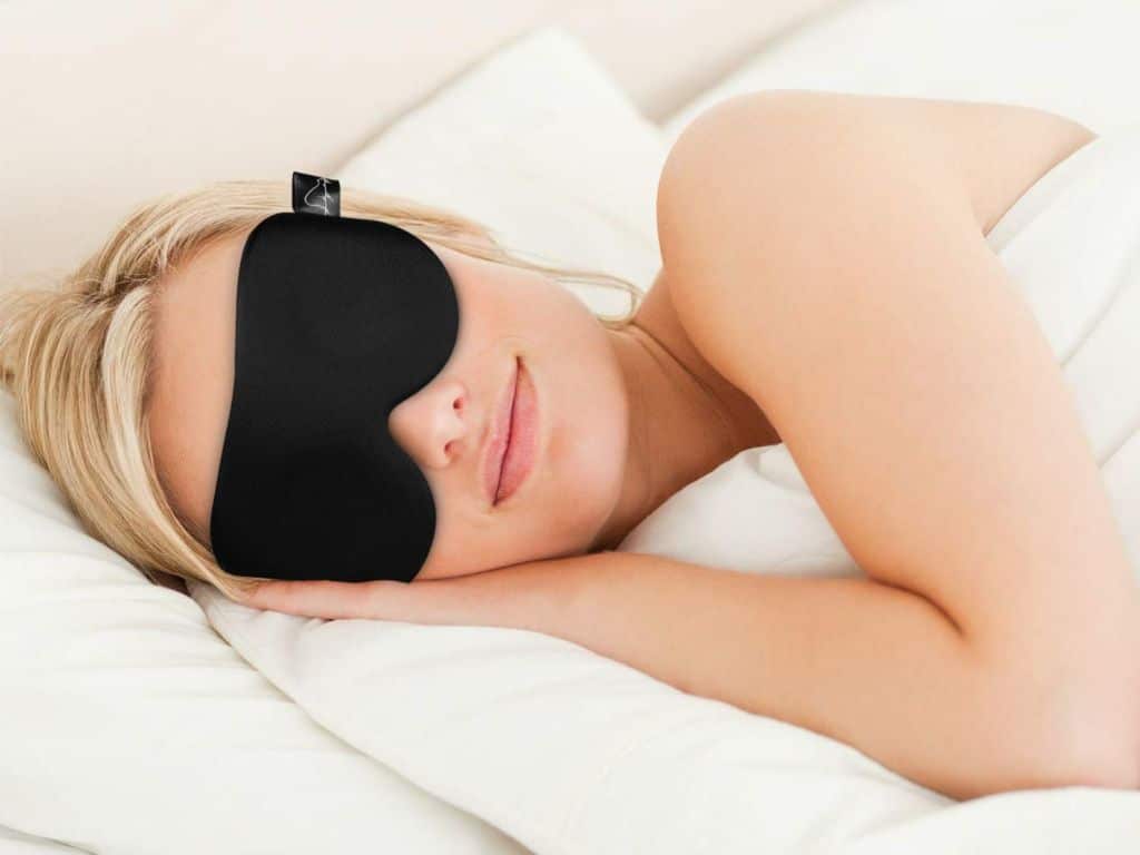 Woman sleeping with sleep mask