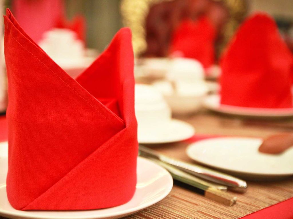 Red napkins on a dinner table