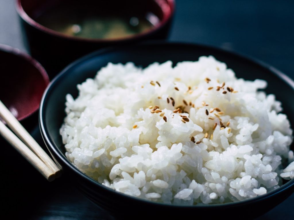 Bowl of rice with chopsticks