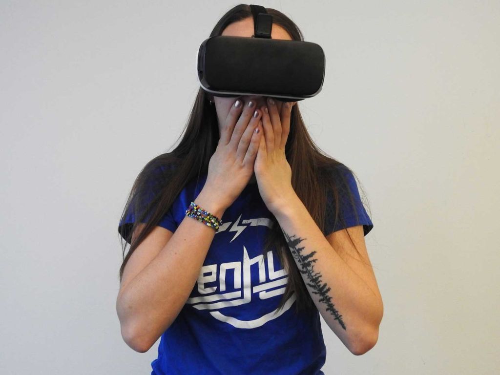 Woman wearing a VR headset.