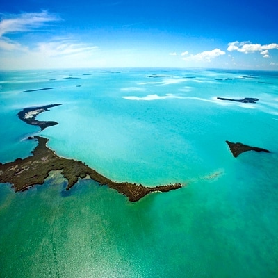Aerial photo of the ocean surrounding the Florida Keys.