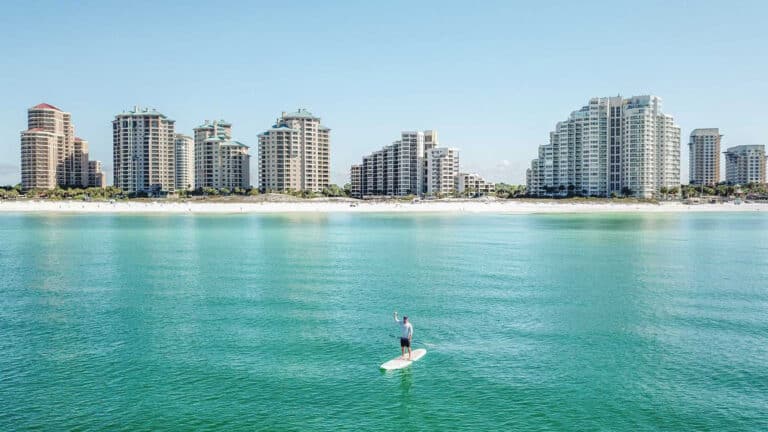 Person paddle boarding at Sandestin Golf and Beach Resort