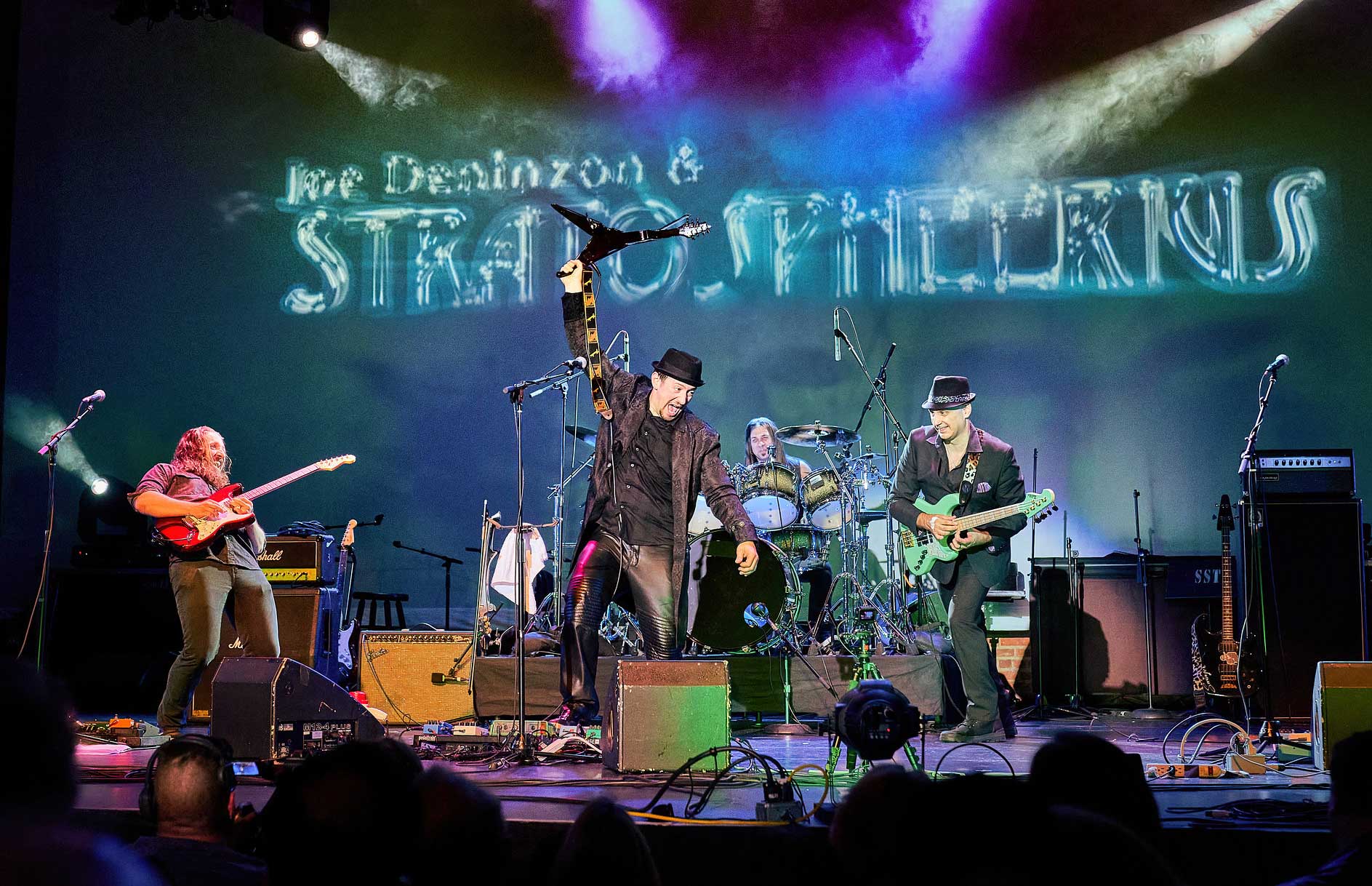 Joe Deninzon also is the lead singer and violinist for the progressive rock band Stratospheerius.