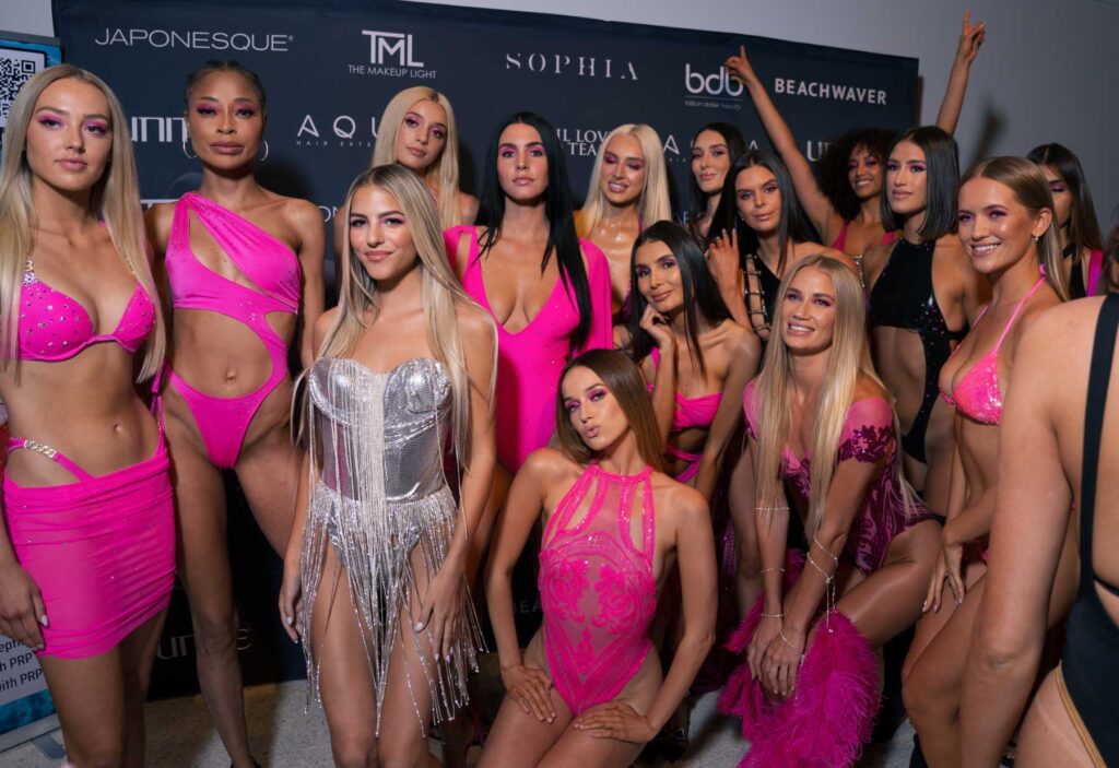 Models gather for runway shows at Miami Swim Week.