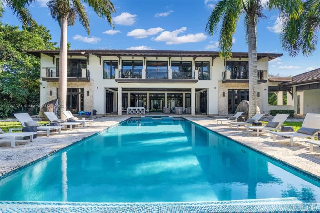 The 14,000-square-foot house has an enormous pool area.