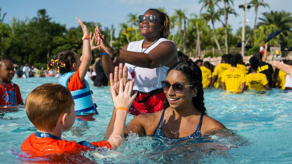 Maritza Correia McClendon in the pool with kids