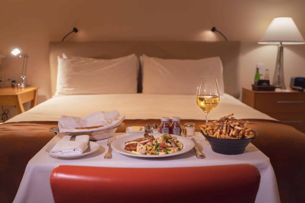 A room service tray in a hotel room