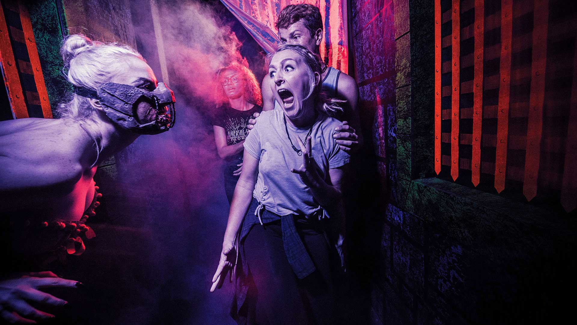 Guests scream during a haunted house visit.