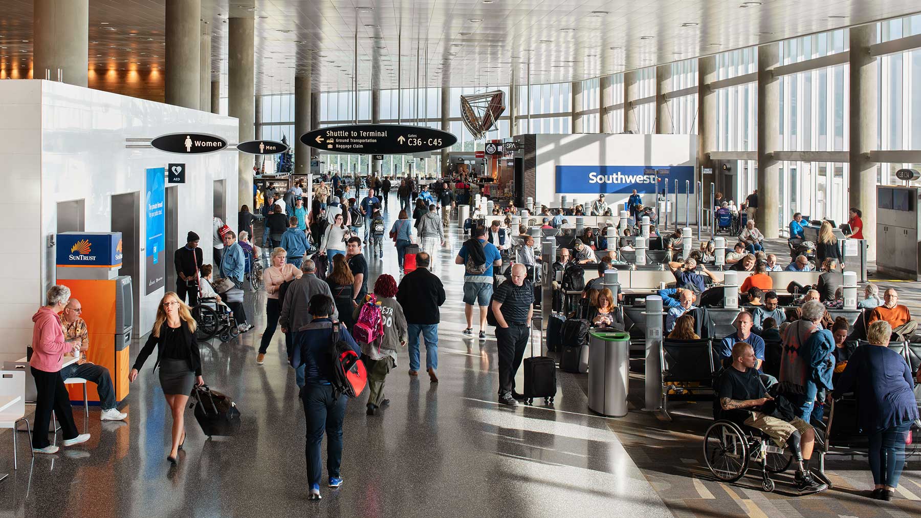 Crowd of people at Tampa International Airport.