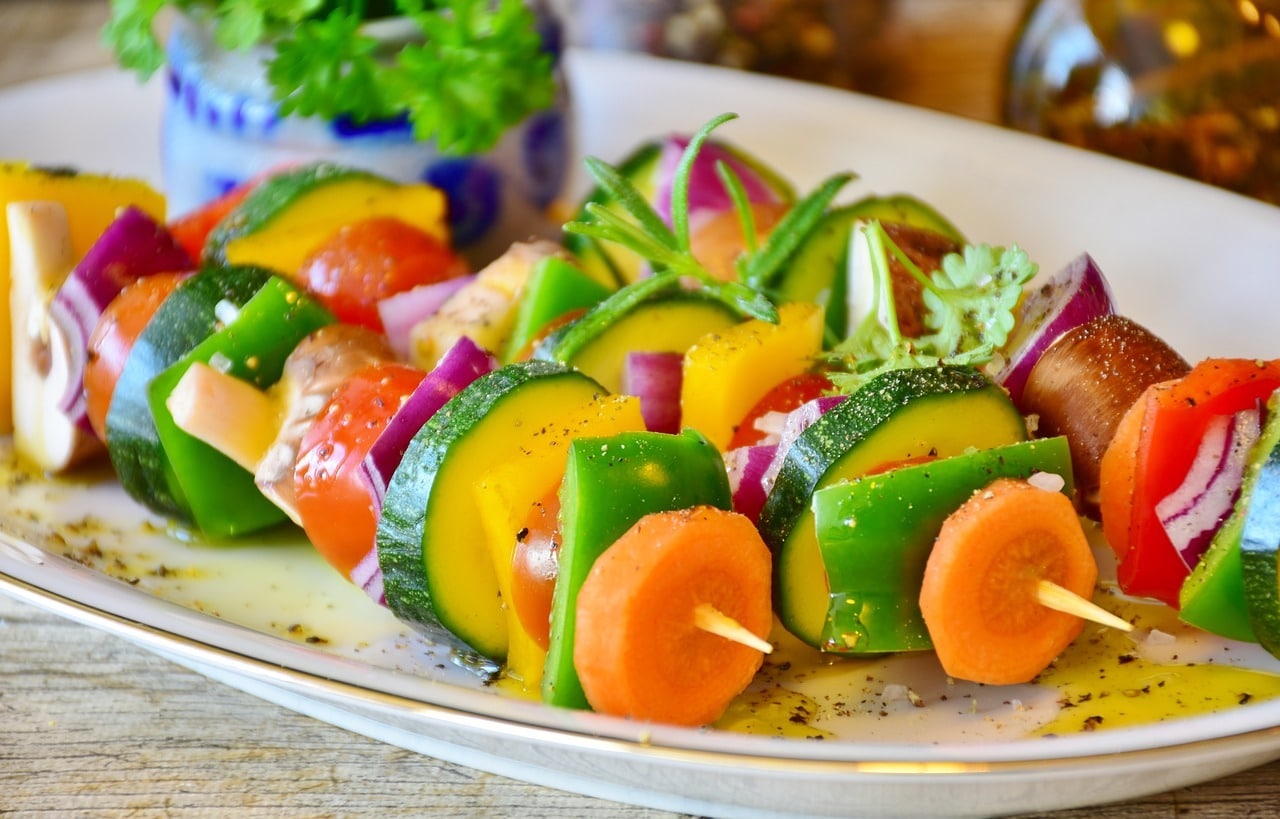 Vegetable skewers on a plate