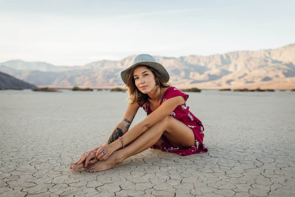 Girl sitting in the sand