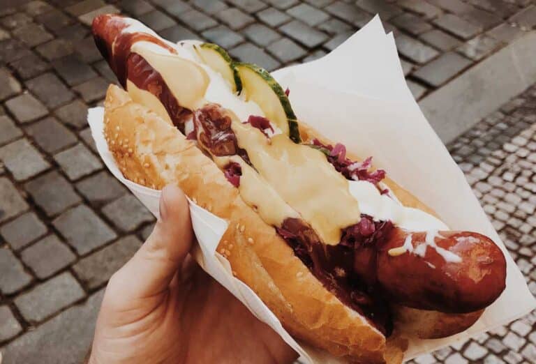 Man holding a hot dog